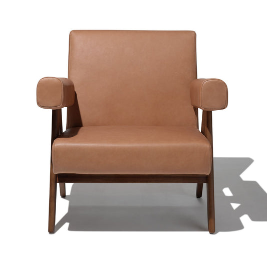 Brown leather armchair on a white background