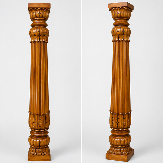 Two matching ornate wooden decorative columns shown side by side against a light gray studio background. The columns have a warm medium-brown finish and are shown from slightly different angles to highlight their carved details.